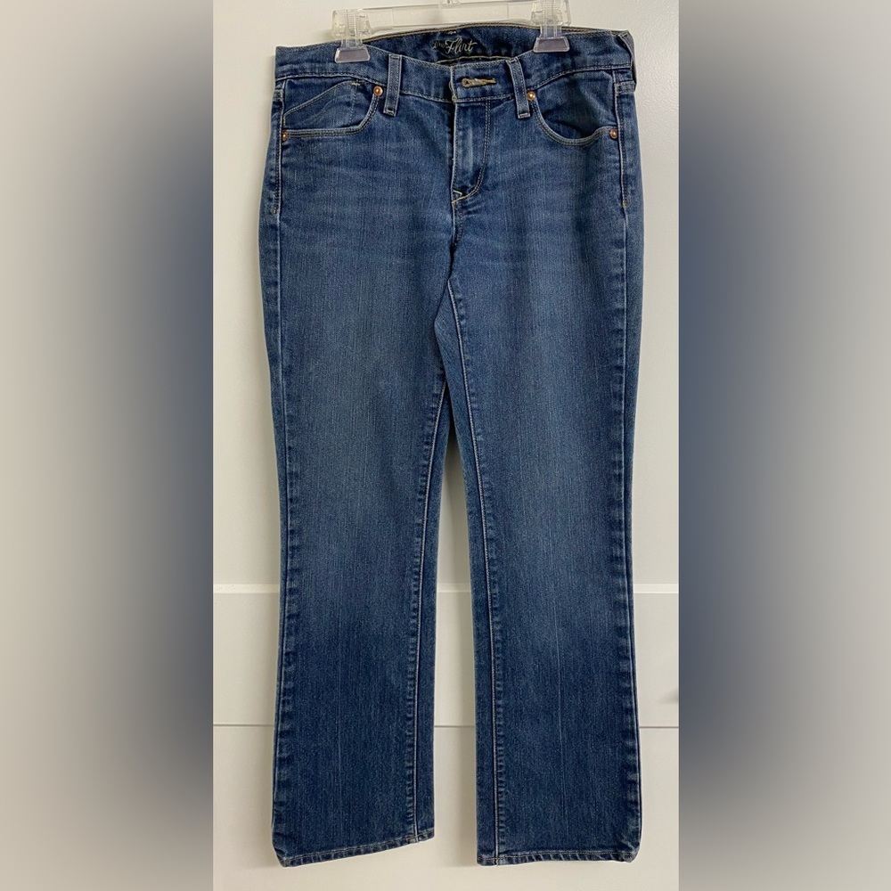 Old Navy Mid Rise-Flirt-Boot Cut Jeans-Medium wash 5 pocket. 4 Short. 29” Inseam